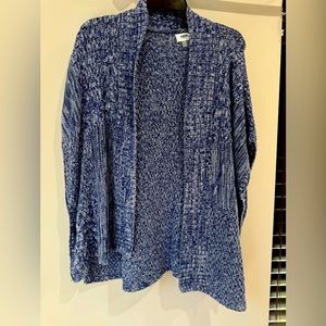 Blue knitted sleeveless cardigan